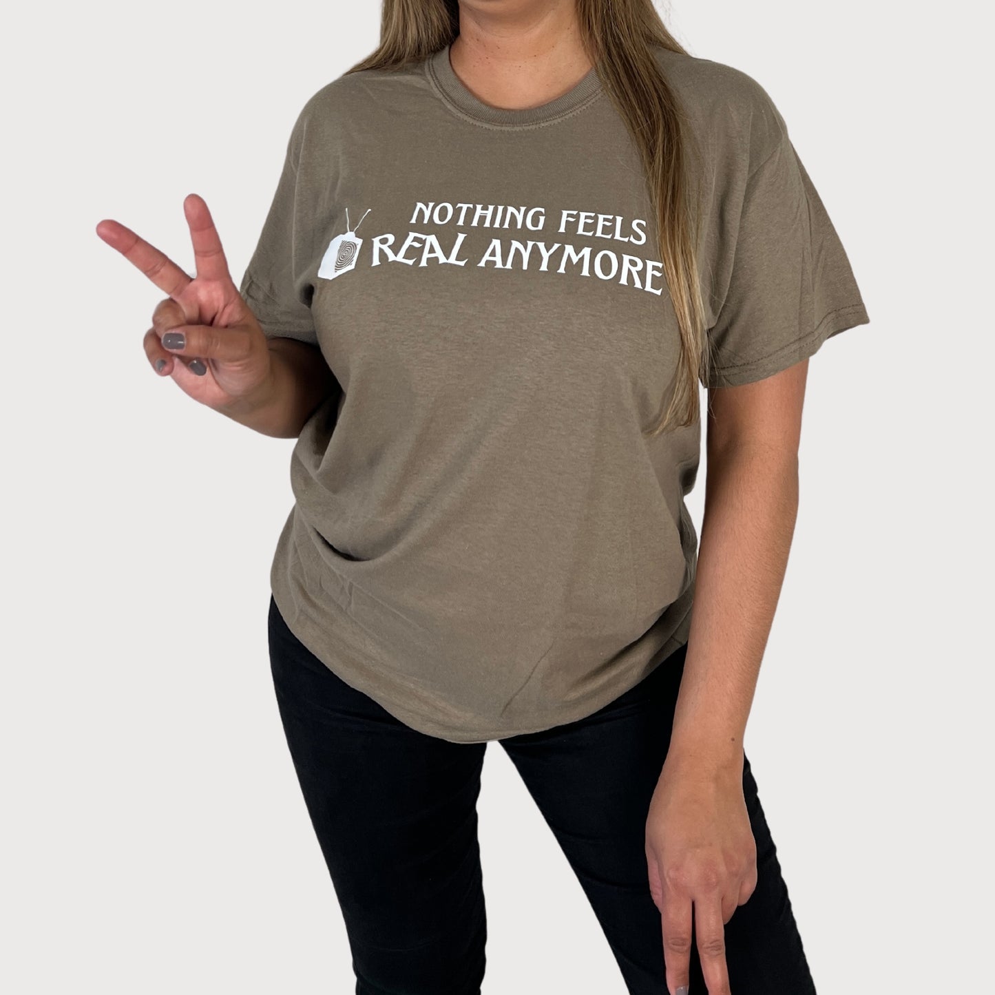 Nothing Feels Real Anymore T-Shirt in Brown color