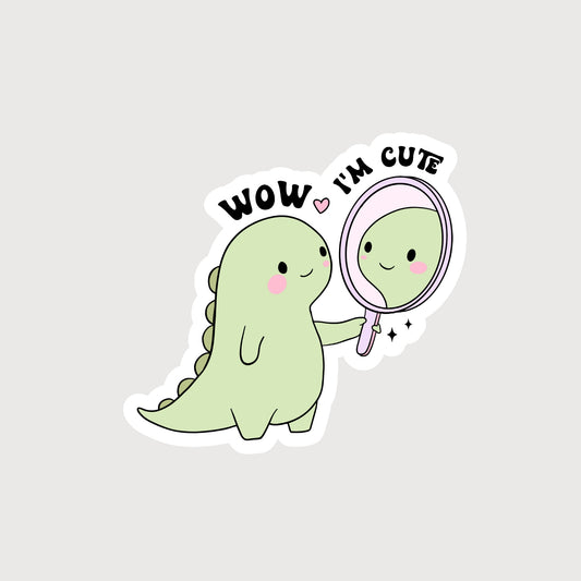 Dinosaur looking in the mirror smiling with the quote wow I'm cute